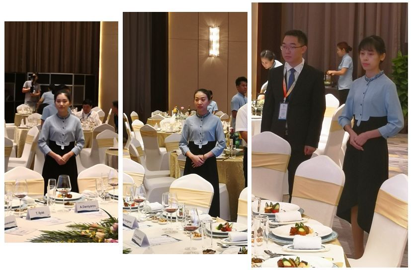 酒店员工郑爱妹（右）、黄文静（中）、王海香（左）参与晚宴主桌服务