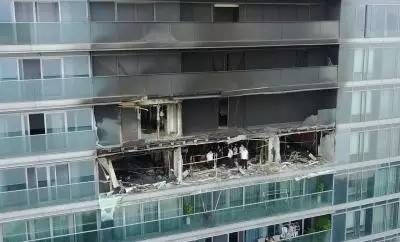 6月22日，航拍发生火灾的杭州蓝色钱江小区2幢1单元1802室，现场一片惨状